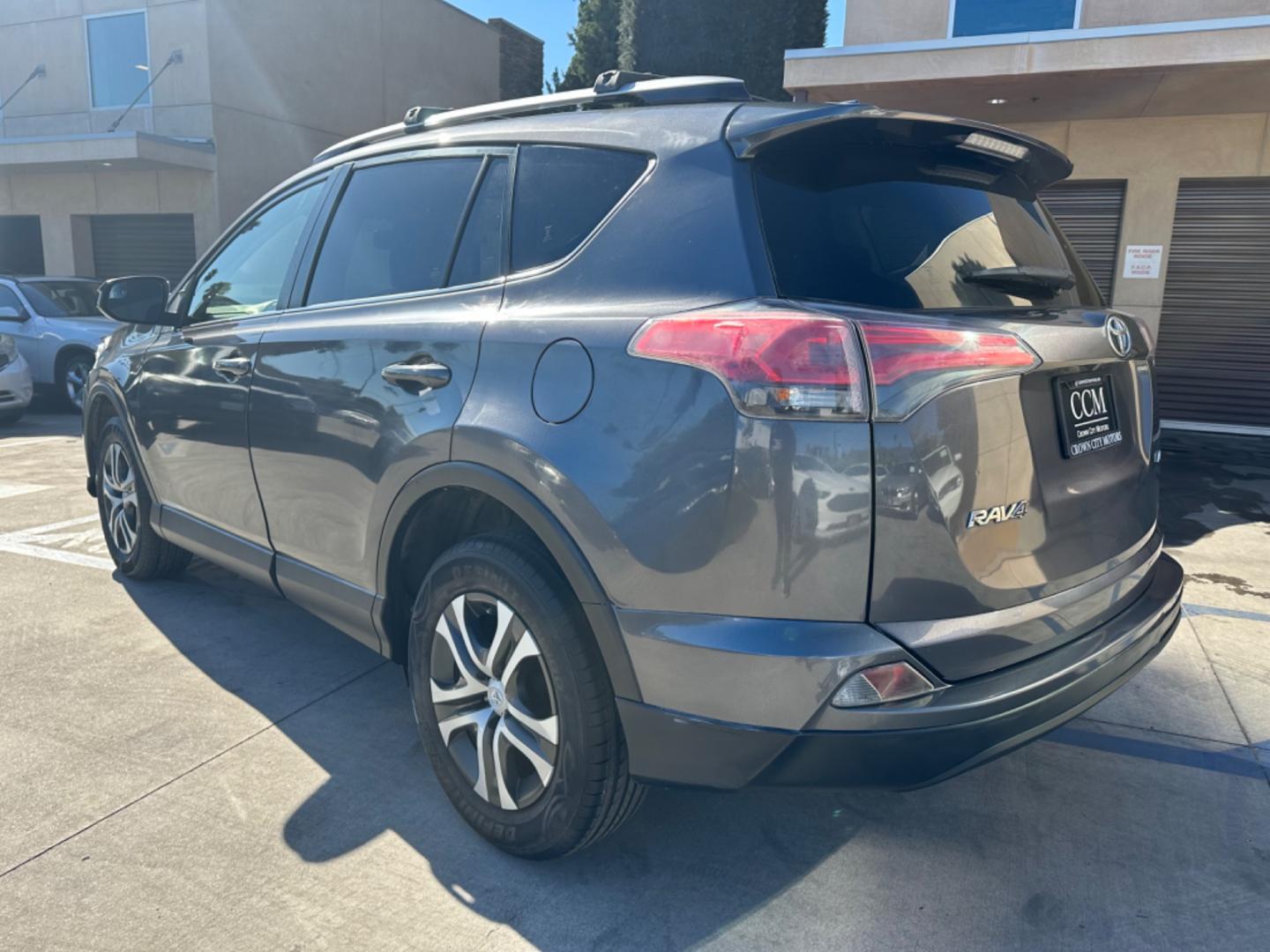 2016 Gray /Black Toyota RAV4 (JTMZFREVXGJ) , AUTOMATIC transmission, located at 30 S. Berkeley Avenue, Pasadena, CA, 91107, (626) 248-7567, 34.145447, -118.109398 - Photo#2